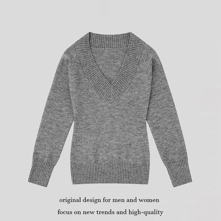 Women's fine knit pullover with deep V-neck, wide ribbed hem, and relaxed fit Mune Fashion
