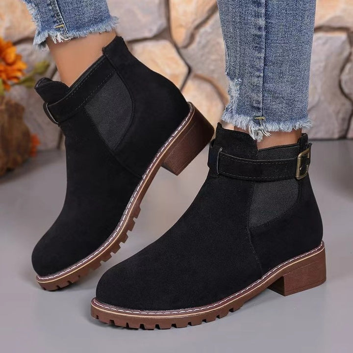 Women's ankle-high Chelsea boots with elastic insert, decorative buckle, and grooved rubber sole Mune Fashion