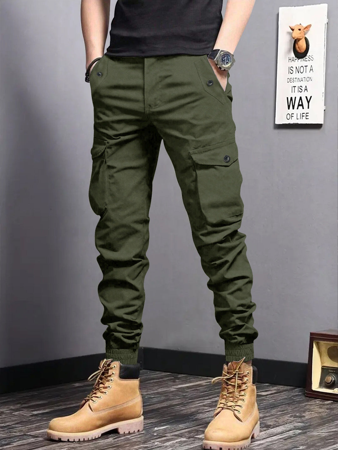 Men's cargo jogger pants with elastic waistband, drawstring, and multifunctional pockets.