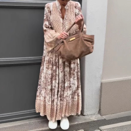Ladies' tiered maxi dress with ethnic border, stand-up collar, and wide bell sleeves Mune Fashion