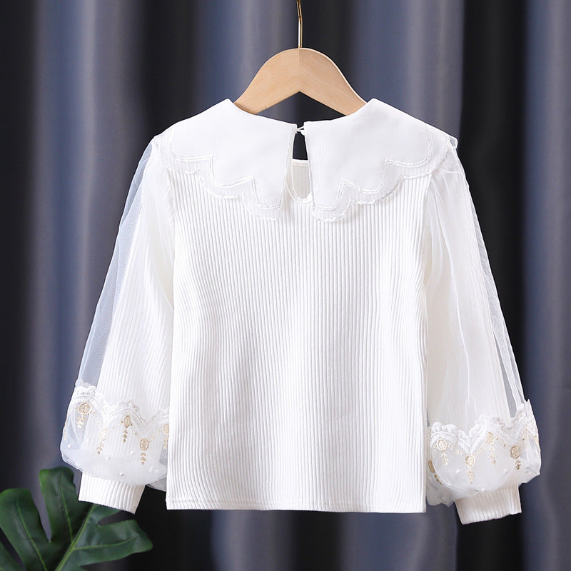 Girl's blouse with romantic tulle sleeves and floral lace trim Mune Fashion