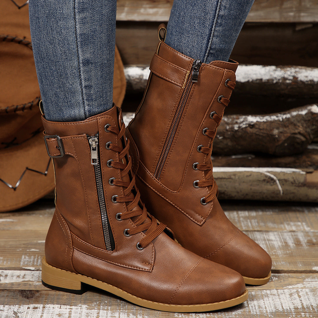 Women's robust lace-up biker ankle boots with side zipper and decorative strap Mune Fashion