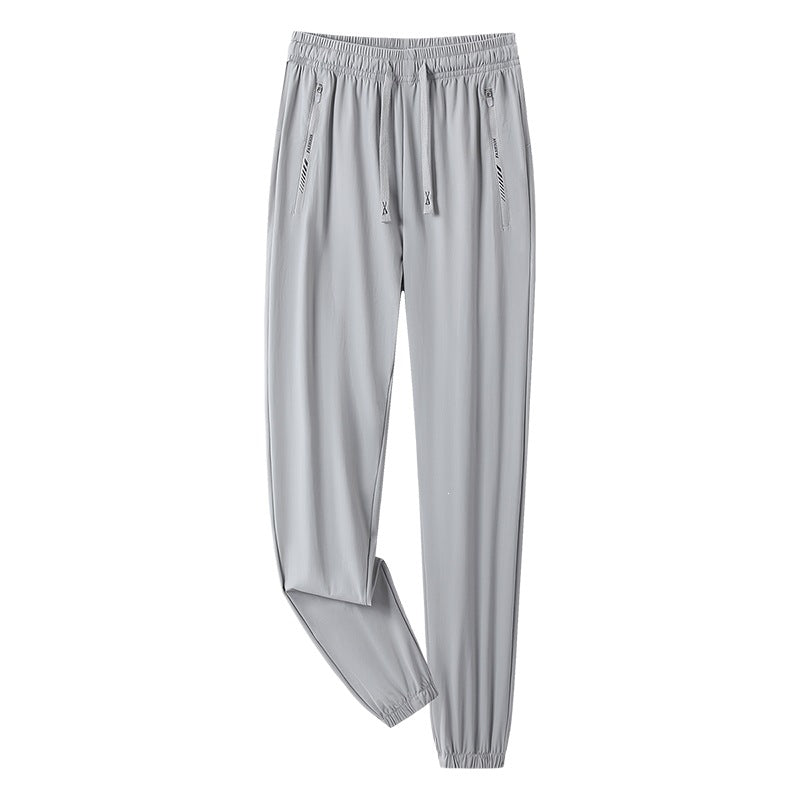 Men's sporty jogging pants with adjustable waistband and zippered pockets Mune Fashion