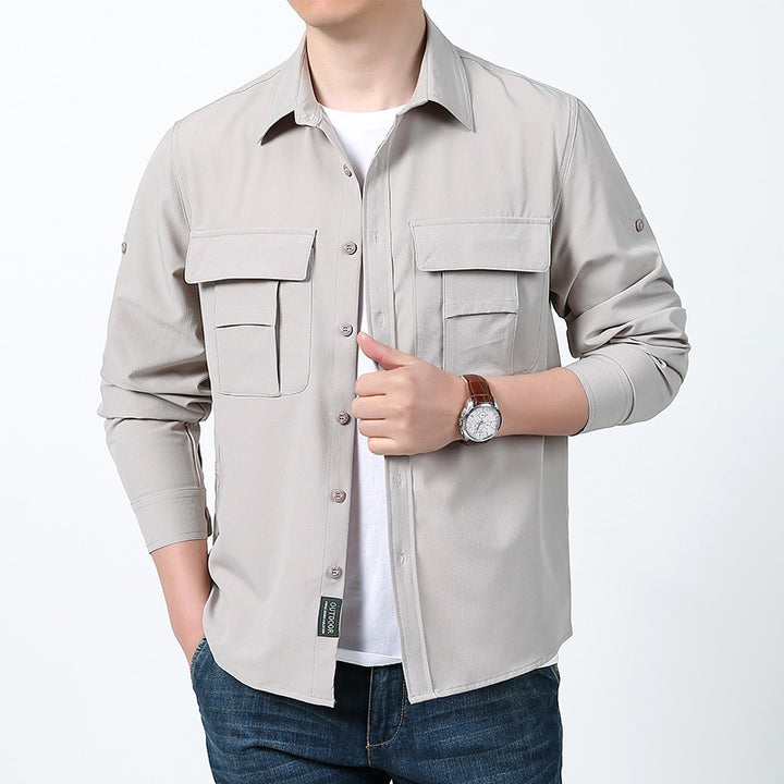 Men's functional field shirt with concealed button placket, applied multiple chest pockets and roll-up sleeves Mune Fashion
