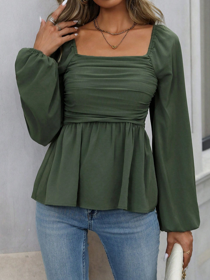 Ladies gathered peplum blouse with square neckline and balloon sleeves Mune Fashion
