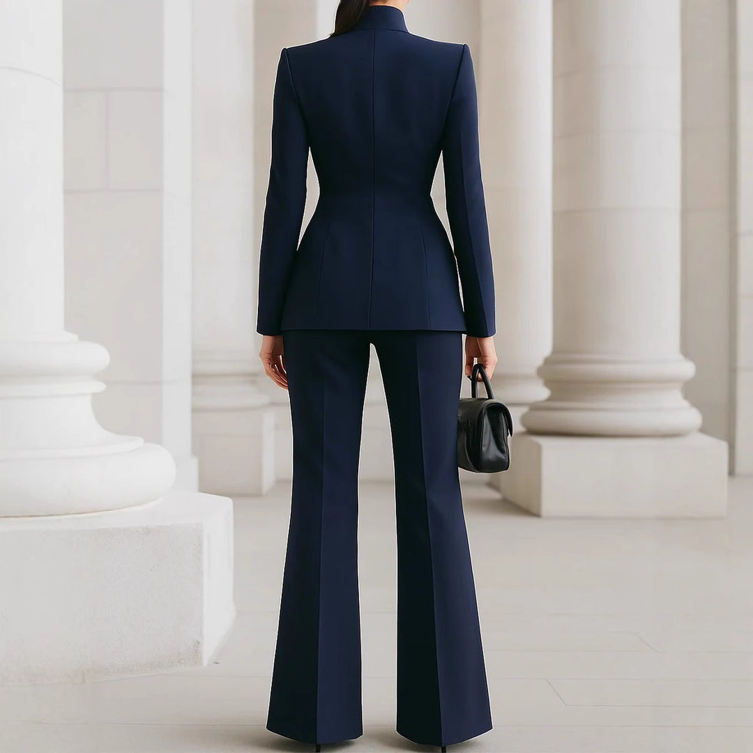 Women tailored suit with stand-up collar, fitted peplum and flared trousers Mune Fashion