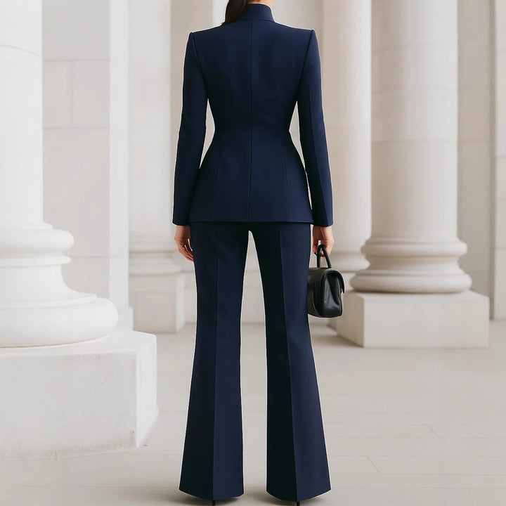 Women tailored suit with stand-up collar, fitted peplum and flared trousers Mune Fashion