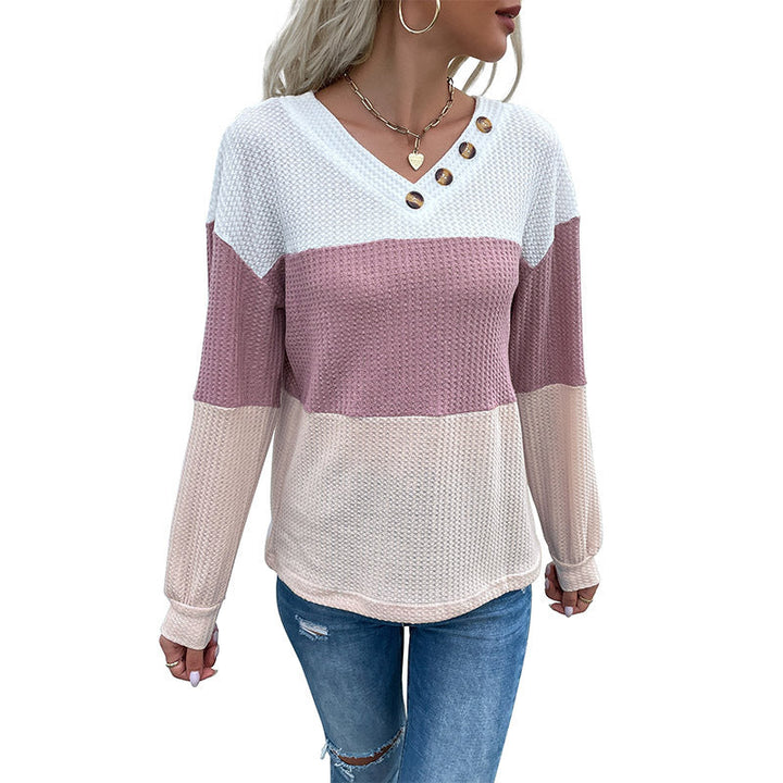 Women's yarn-structured color block pullover with V-neck and decorative button placket Mune Fashion