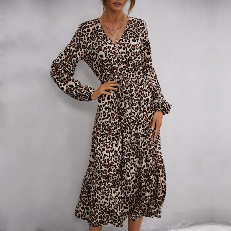 Women’s midi dress in leopard print with V-neckline, button placket, drawstring waist, and tiered skirt Mune Fashion