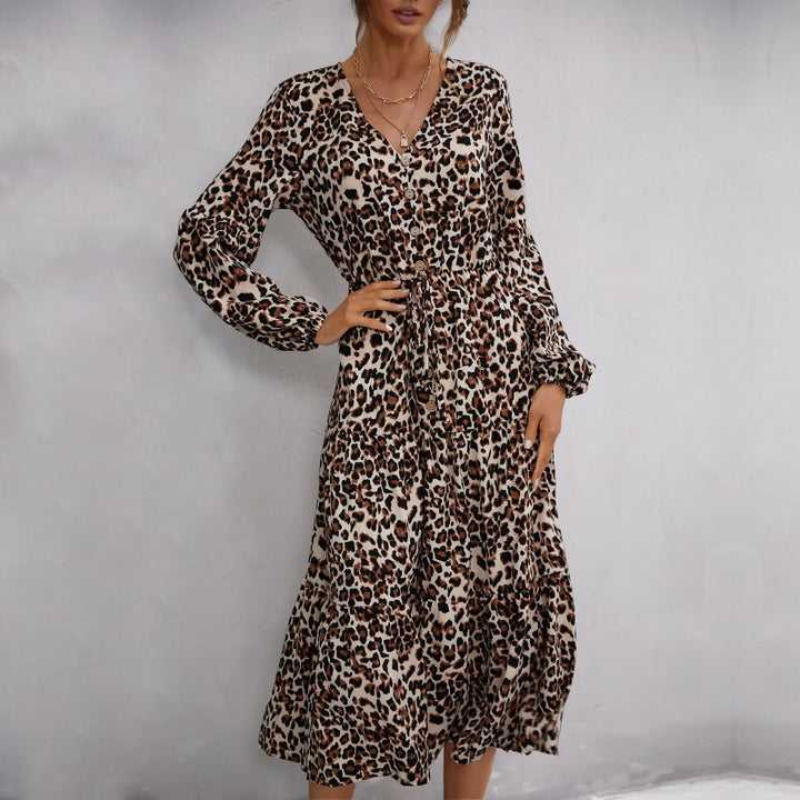 Women’s midi dress in leopard print with V-neckline, button placket, drawstring waist, and tiered skirt Mune Fashion