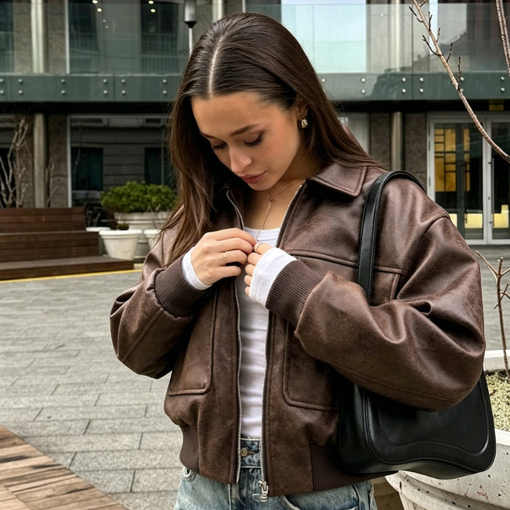 Women's short bomber jacket in suede look with large flap pockets and ribbed cuffs Mune Fashion