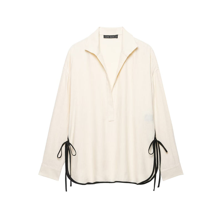 Women's oversized tunic with V-neck, lapel collar, and side ribbon details Drune