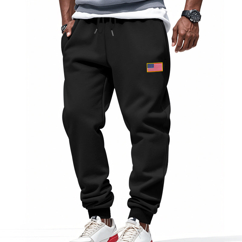 Men's slim-fit sweatpants with tapered leg, elastic drawstring waistband, and discreet flag application Mune Fashion