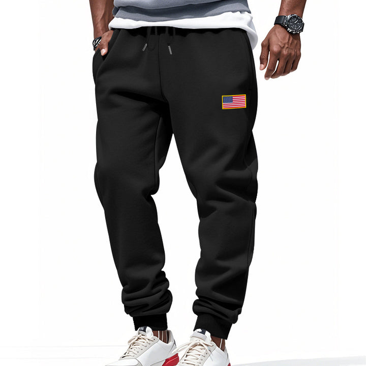 Men's slim-fit sweatpants with tapered leg, elastic drawstring waistband, and discreet flag application Mune Fashion