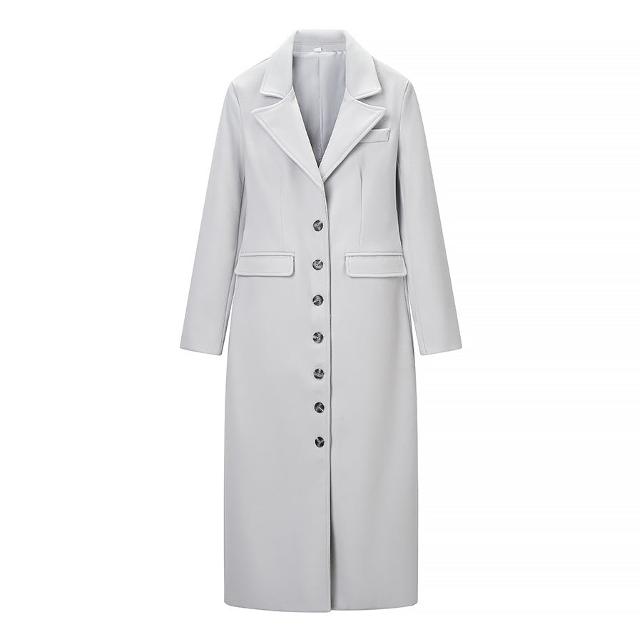 Women's longline coat made of wool blend with fitted silhouette, lapel collar and full button placket Mune Fashion