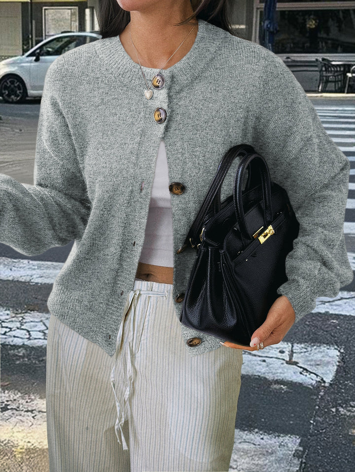 Women's cozy oversized knitted cardigan with horn button placket and round neckline Mune Fashion