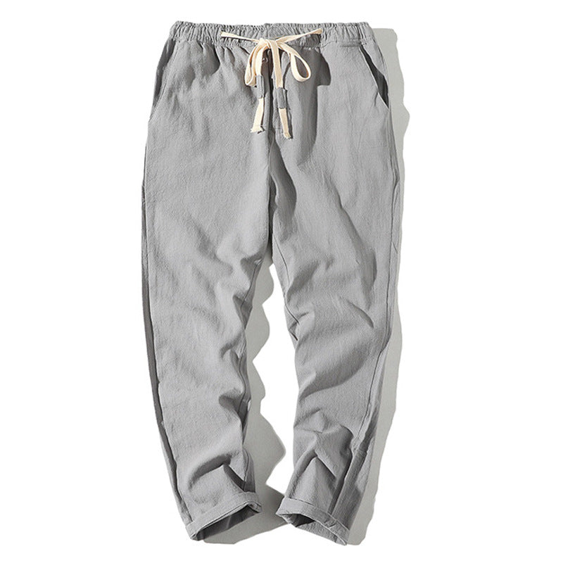 Men's lightweight linen trousers with elastic waistband and drawstring, tapered fit and roll-up hem Mune Fashion