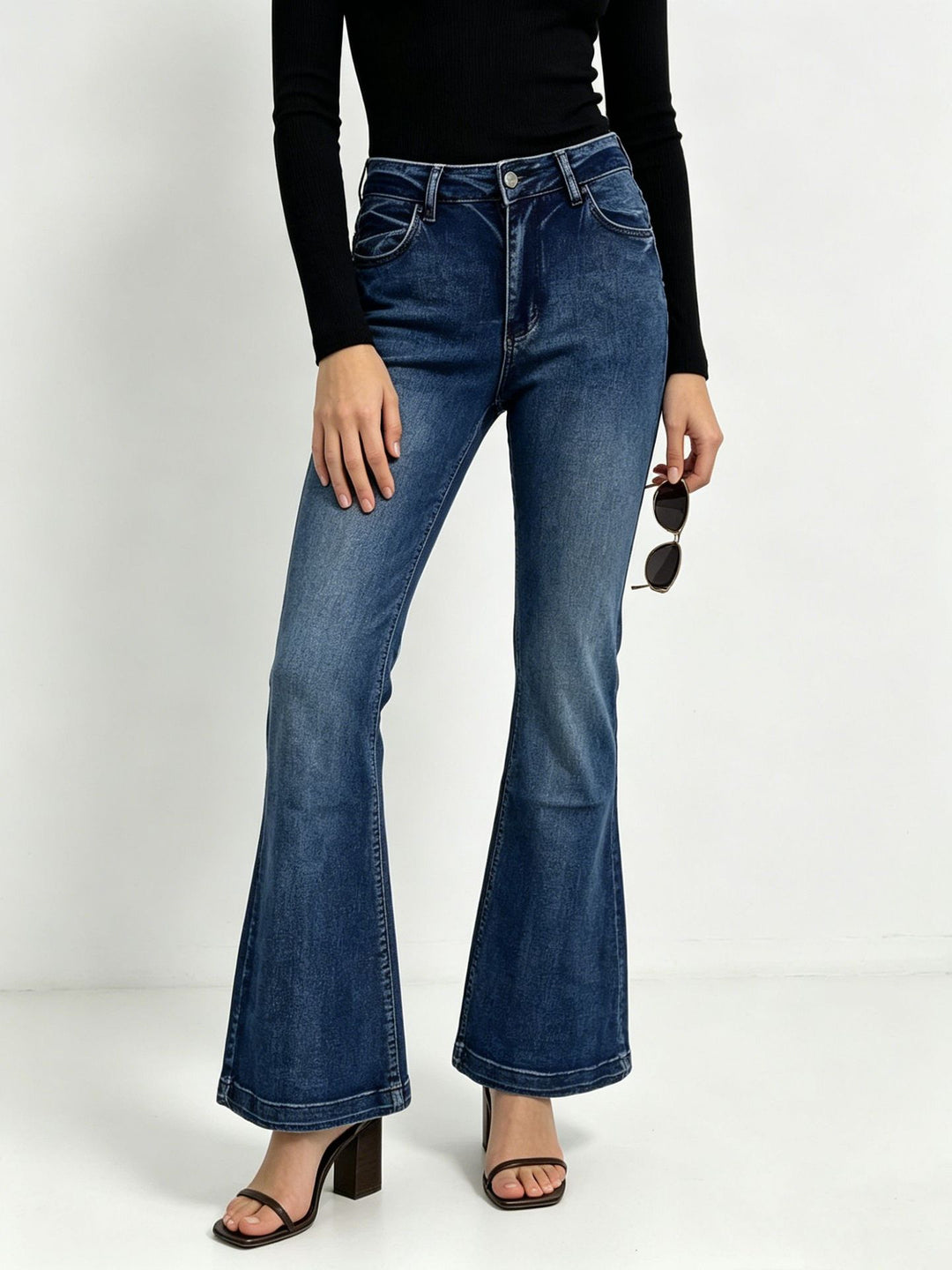 Women's High-Waist Flared Jeans with figure-hugging waistband and wide flare Mune Fashion