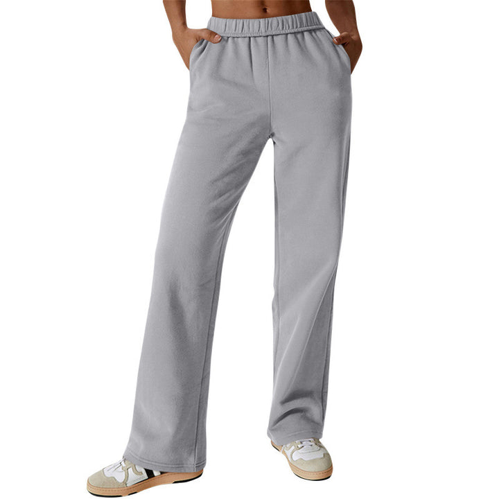 Women high-waisted flared lounge pants with elastic comfort waistband and concealed pockets Mune Fashion
