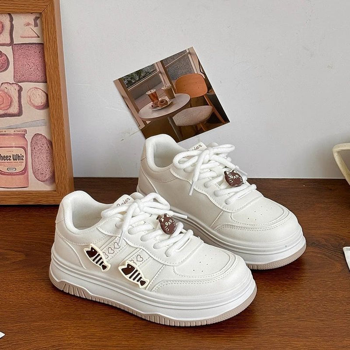 Women's platform sneaker with decorative fish charms and padded comfort insole Mune Fashion
