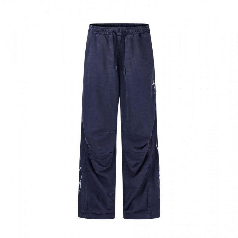 Men's loose sweatpants in baggy cut with elastic waistband, drawstring and gathered knee area Mune Fashion