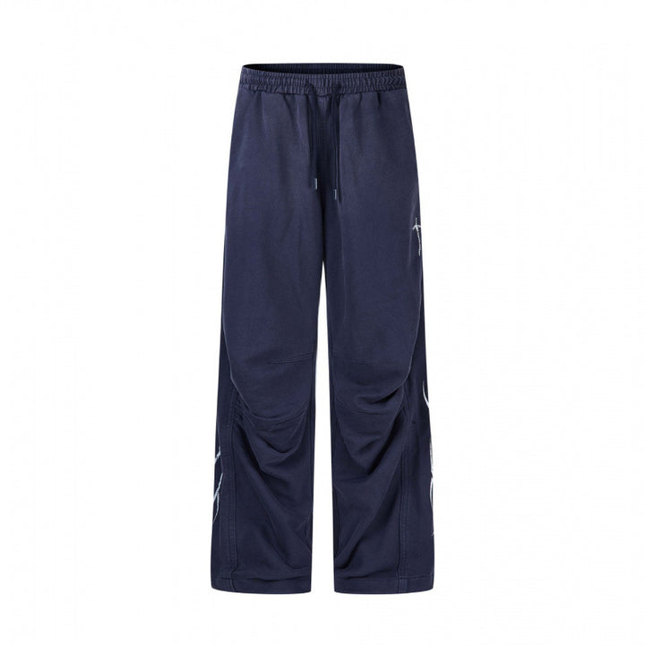 Men's loose sweatpants in baggy cut with elastic waistband, drawstring and gathered knee area Mune Fashion