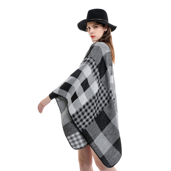 Women's oversized cape in plaid mix made of wool blend with crochet trim Mune Fashion
