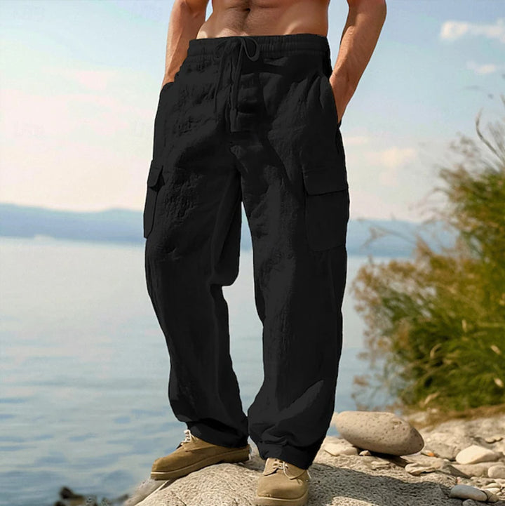 Men's wide casual cargo pants made of linen-cotton blend with elastic waistband, drawstring and large flap pockets Mune Fashion