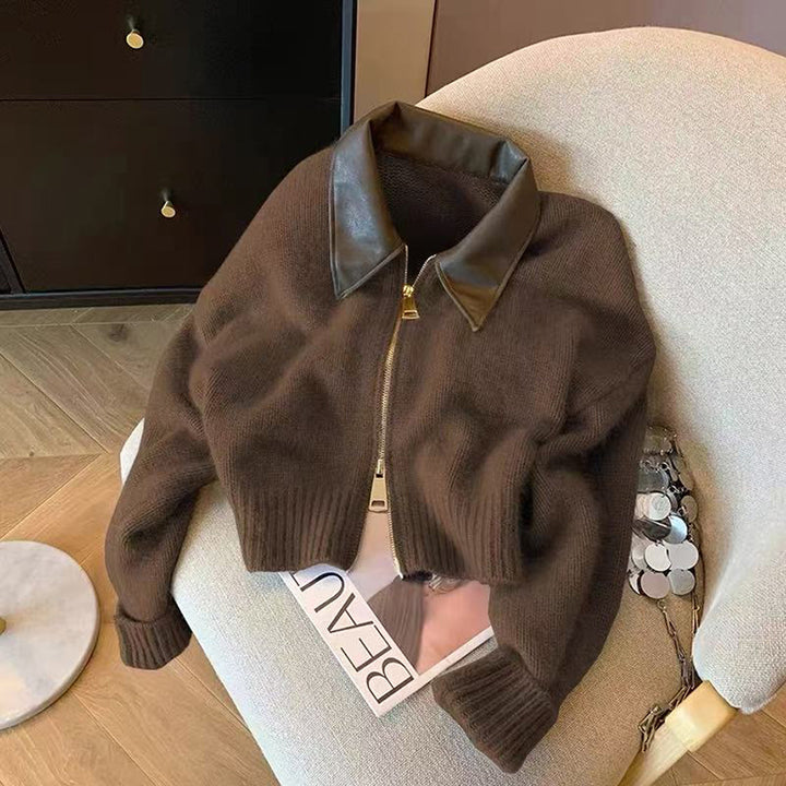 Women's short-cut knitted blouse with faux leather collar and gold-colored metal zipper Mune Fashion