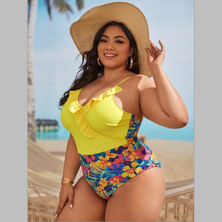 Women's one-piece swimsuit with asymmetrical ruffle design and floral pant area Mune Fashion