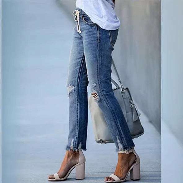 Women Cropped Denim Jeans with Drawstring Waistband, Destroyed Knee Areas and Raw Hem Mune Fashion