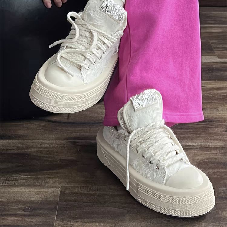Women's sneakers with glittering appliqués and raised platform Mune Fashion
