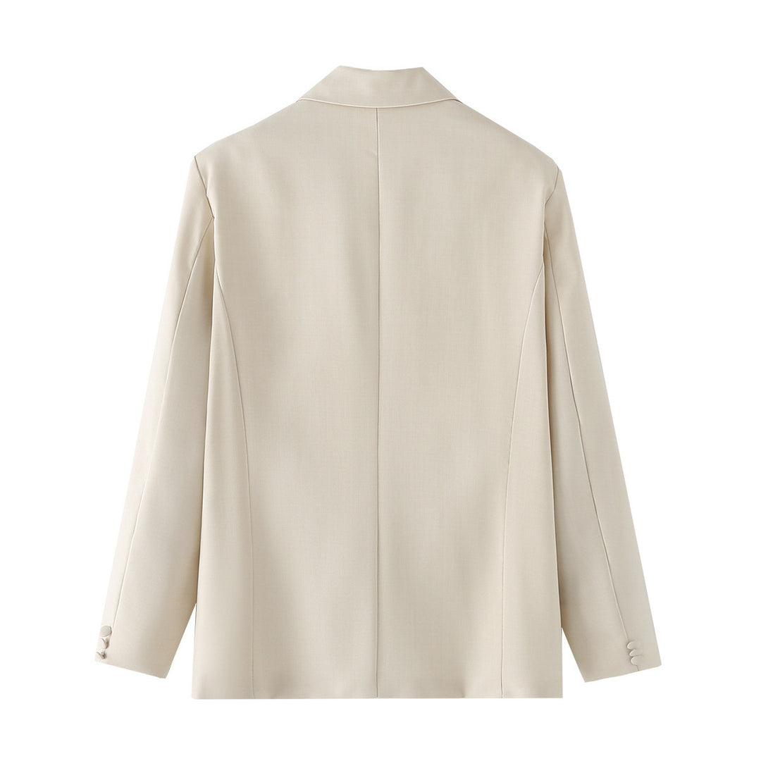 Ladies' three-piece suit set with chain crop top, loose blazer, and high-waisted pleated trousers Mune Fashion