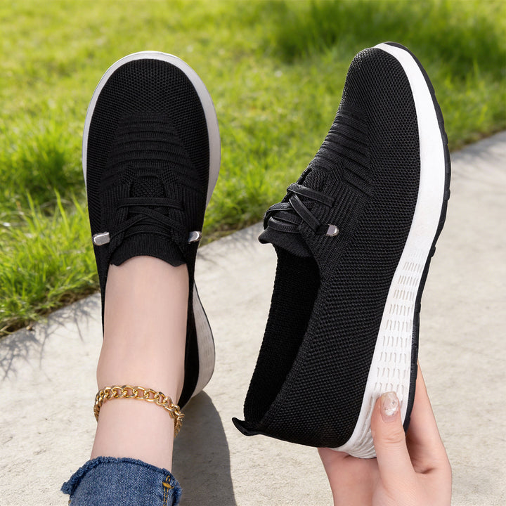 Women's lightweight knitted slip-on casual shoe with elastic entry, decorative lacing, and cushioning lightweight profile sole Mune Fashion