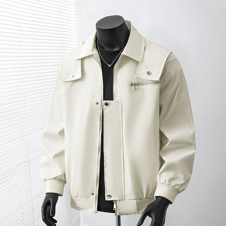 Men's lightly padded bomber coach jacket with concealed snap button placket, zipper chest pocket & ribbed cuffs Mune Fashion