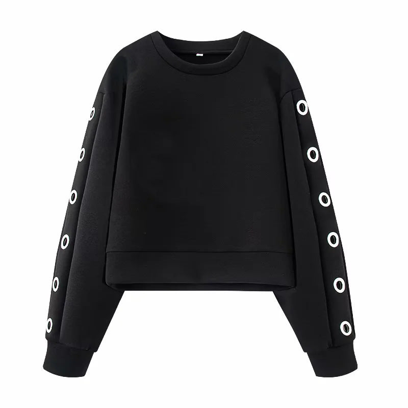 Women's oversized sweatshirt with decorative metal eyelets on the sleeves Mune Fashion