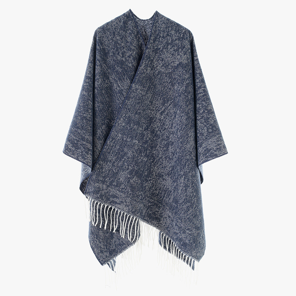 Women's poncho made of wool blend knit with fringes and wide oversized cut Mune Fashion