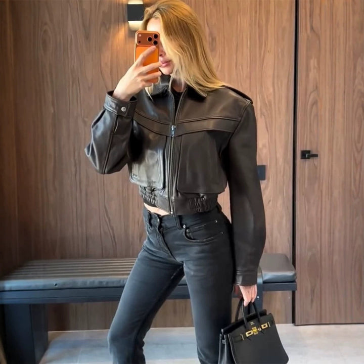 Women's short-cut leather jacket with elastic hem and patch chest pockets Mune Fashion