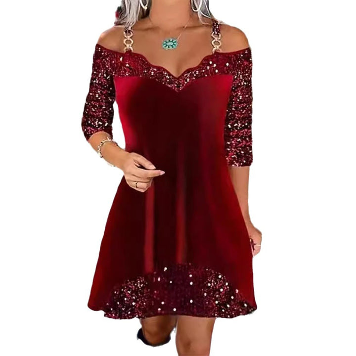 Women's off-shoulder sequin swing dress with delicate chain straps, elbow-length sleeves, and ruffle trim Mune Fashion