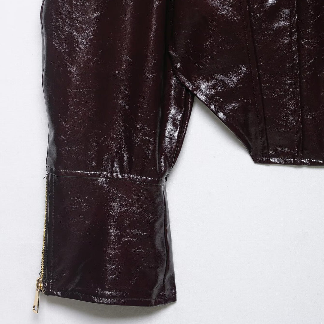Women's short shiny biker jacket in leather look with emphasized shoulder area Mune Fashion