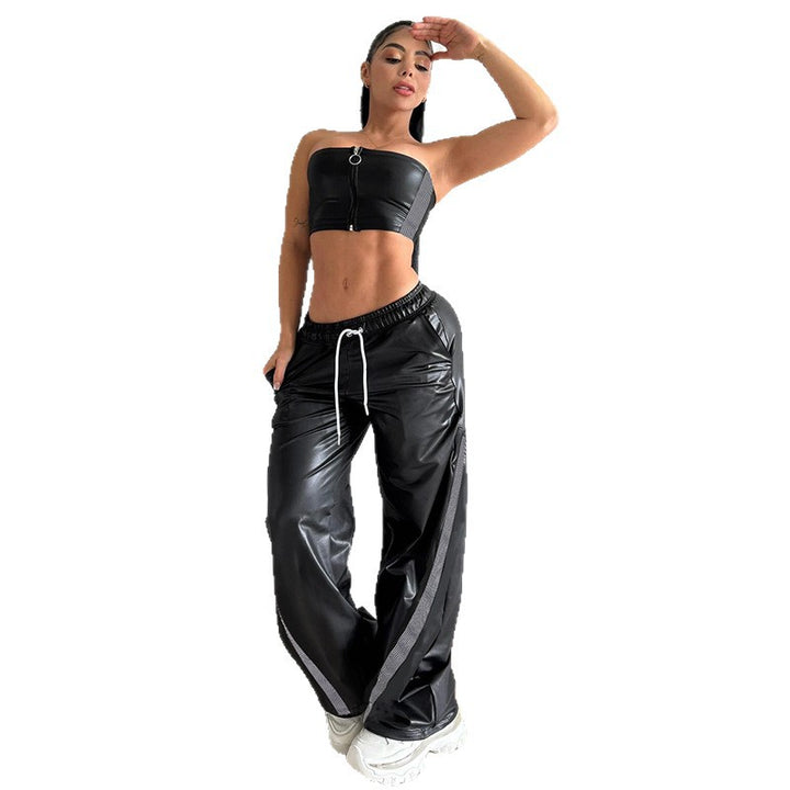 Ladies wide faux leather track pants with elastic waistband, drawstring and side stripes Mune Fashion