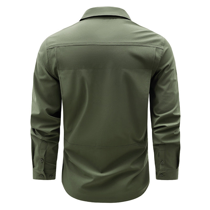 Men's lightweight travel utility shirt with double chest pockets, quick-drying ripstop fabric, and ergonomic cut.