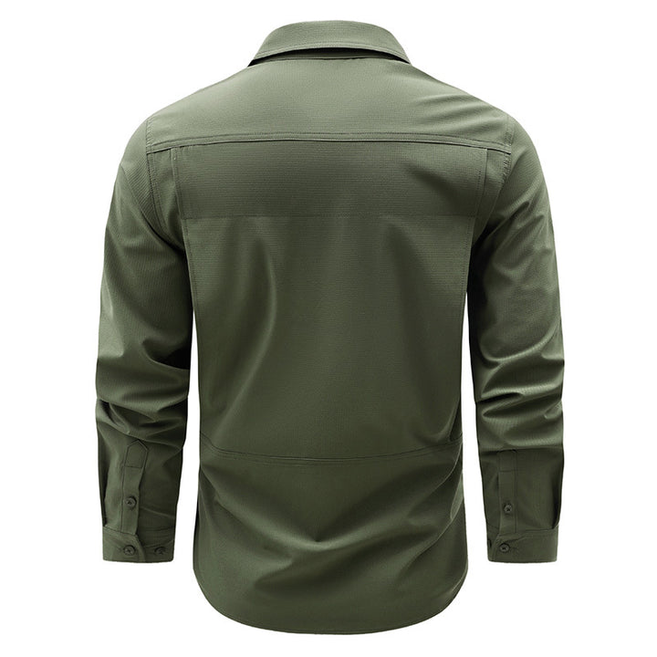 Men's lightweight travel utility shirt with double chest pockets, quick-drying ripstop fabric, and ergonomic cut.