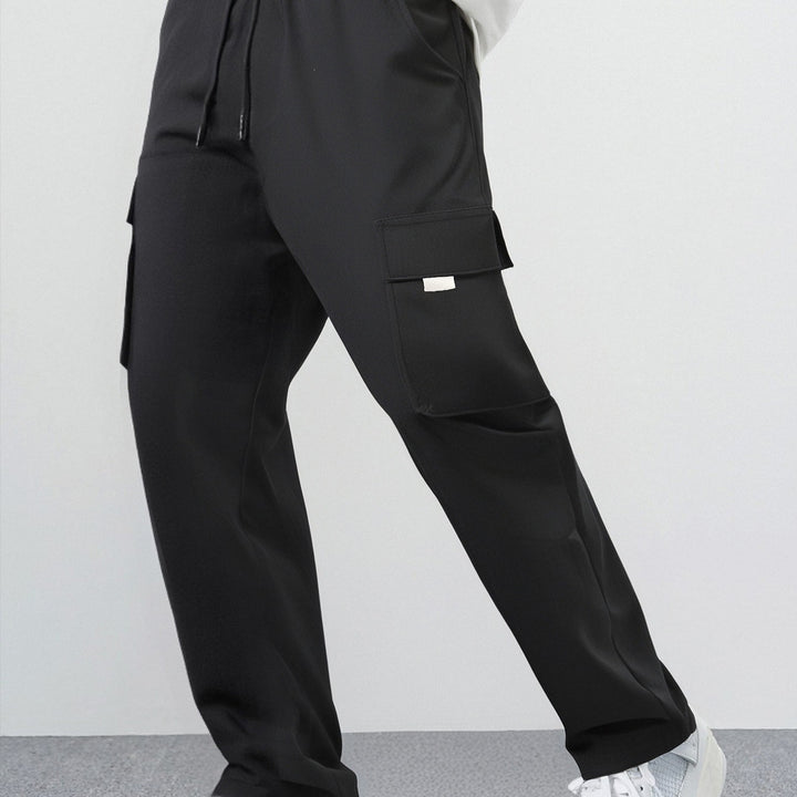 Men's loose cargo casual pants made of lightweight functional fabric with large flap pockets Mune Fashion