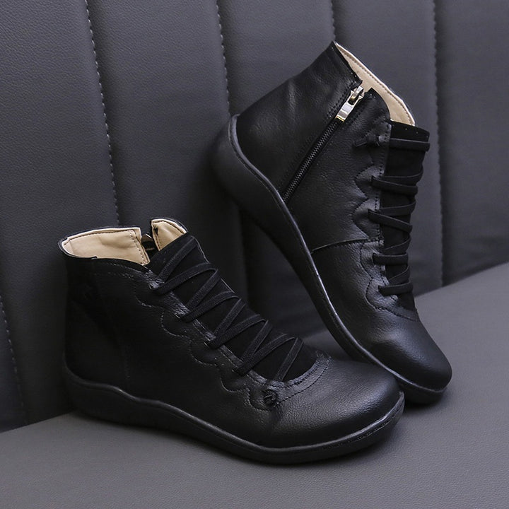 Women's ankle-high leather ankle boot with side zipper, elastic lacing, and ergonomic comfort sole Mune Fashion