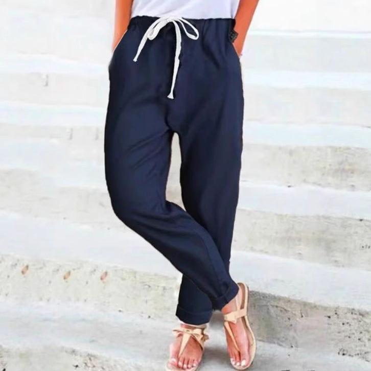 Women's casual relaxed pants with elastic waistband, drawstring, side pockets, and rolled hem Mune Fashion