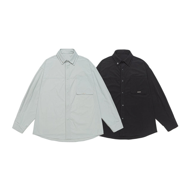 Unisex Oversize Shirt with technical material, breast flap and rounded hem Mune Fashion