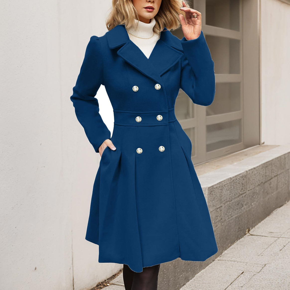 Women's fitted balloon coat with double-breasted front, flared skirt section and decorative buttons Mune Fashion