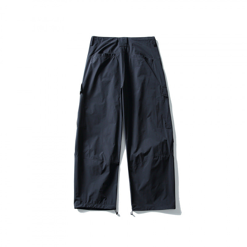 Men's loose technical cargo pants with drawstring waistband and adjustable leg closures Mune Fashion