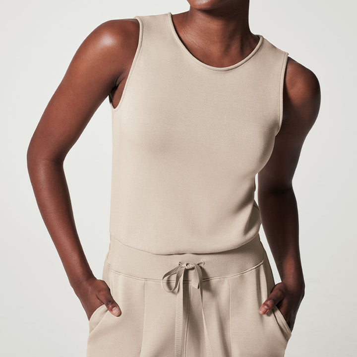 Women's sleeveless knitted jumpsuit with wide palazzo legs, drawstring waistband, and patch pockets Mune Fashion